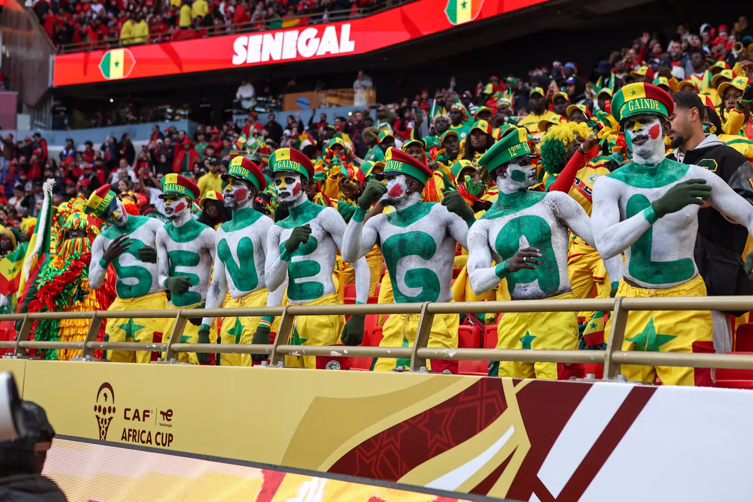 afcon fans watching football match
